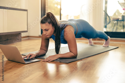 Woman Doing Online Workout At Home