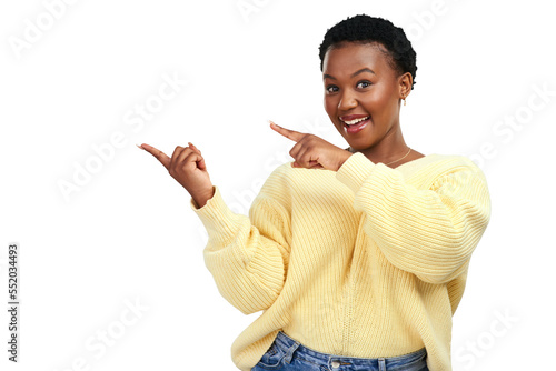 PNG shot of a young woman pointing at copy-space while posing.