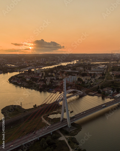 sunset over the river gdansk bridge