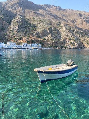 a boat in the harbor of Loutro, Crete
