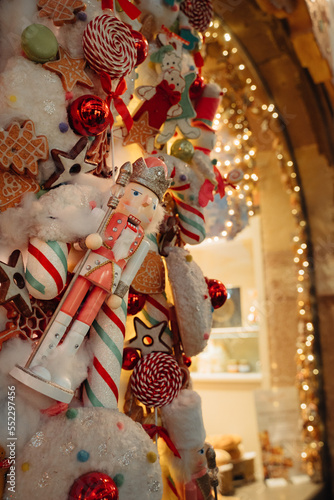 STRASBOURG, FRANCE - December 2019 - pink Nutcracket Christmas decoration on bakery shop