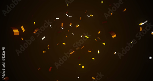 Image of confetti falling over black background