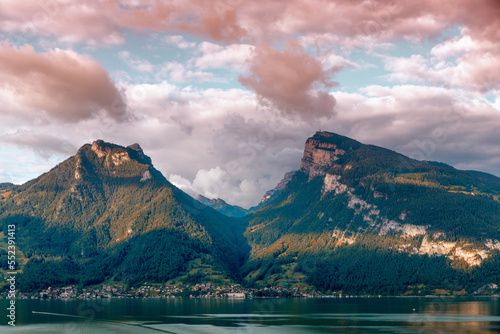 lake Thunersee with view to Niederhorn mountain, dramatic clouds