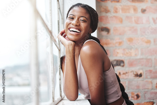 Fitness, black woman and happy laughing by window in gym for training motivation, workout wellness and sports rest. Happy, african woman smile and exercise for comic joke or healthy cardio portrait