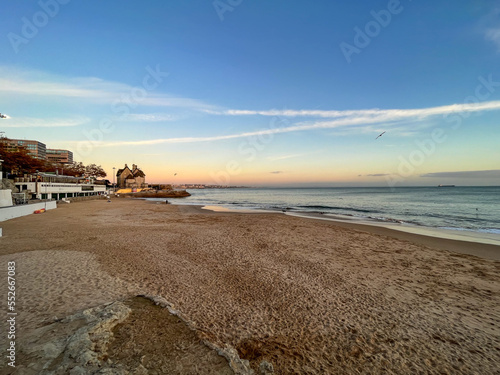 Amazing sunset in a beach of the village of Cascais in Portugal,