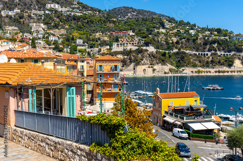 Panoramic view of harbor, yacht marina and beach onshore Mediterranean Sea in Villefranche-sur-Mer resort town in France