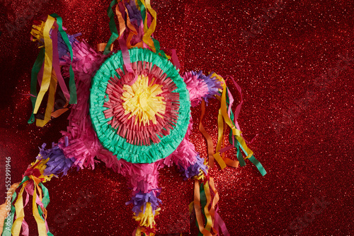 Mexican Pinata used in posadas and birthdays on red background