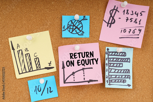 On the board are stickers with graphs and diagrams and the inscription - RETURN ON EQUITY