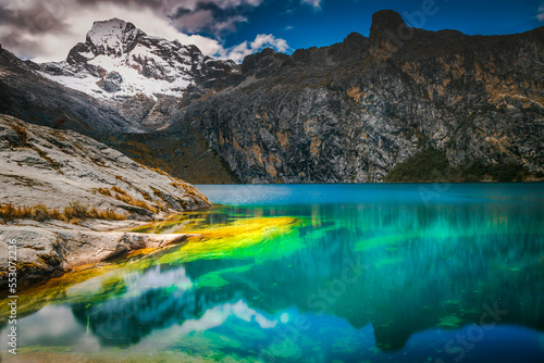 Turquoise Churup lake in Cordillera Blanca, snowcapped Andes, Ancash, Peru