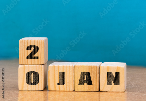 Cube shape calendar for January 20 on wooden surface with empty space for text,cube calendar for January on wood background