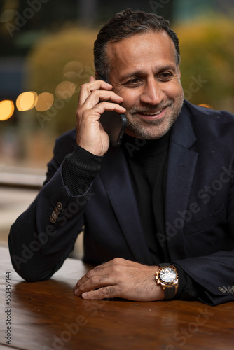 Mature man talking on phone