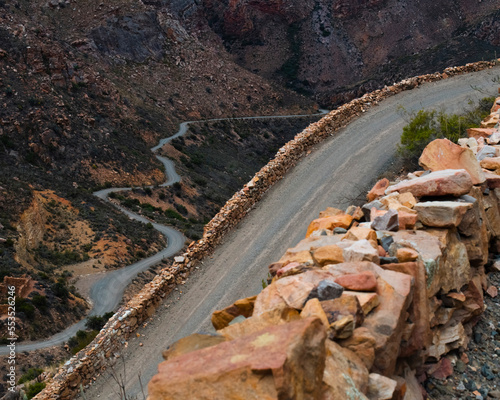 Ascending the serpentine Swartberg Pass. View form Muller's Kloof down towards the ruins of Blikstasie which once housed the convicts who build this road.