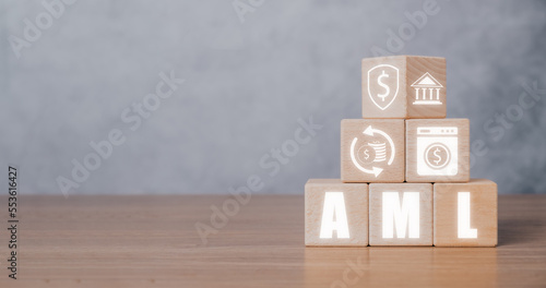 AML, Anti Money Laundering Financial Bank Business Concept, Wooden cube block with AML icon with copy space