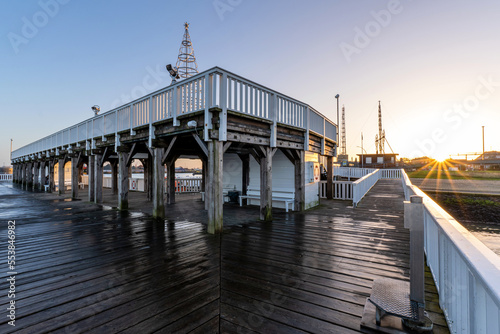 ‘Alte Liebe’ (‘Old Love’), famous observation deck in Cuxhaven, Germany at the river Elbe at sunset