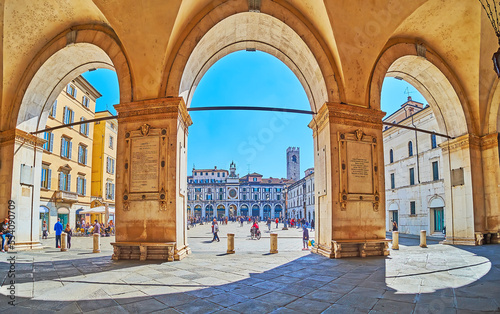 The arches of Palazzo della Loggia palace and Loggia Square, Brescia, Italy