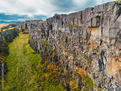 Steep rock wall, the ending of Atlantic tectonic plate in Thingvellir National Park