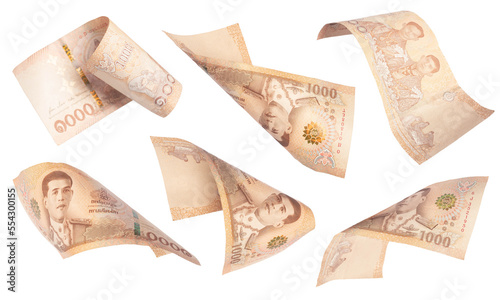 Bank 1000 baht. Falling money isolated on white background, Thailand cash