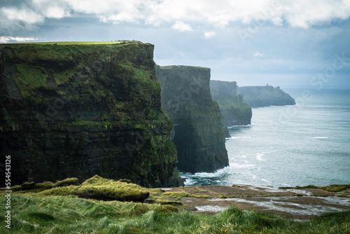 Coastal paradise in Ireland with cliffs, green grass, and ocean