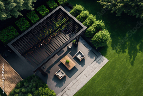 Modern black bio climatic pergola with top view on an outdoor patio. Teak wood flooring, a pool, and lounge chairs. green grass and trees in a garden. Generative AI