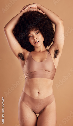 Beauty portrait, skincare and black woman body positivity in studio for dermatology wellness, self care and natural body care motivation in underwear. African woman, confident model and self love