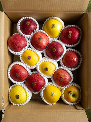 The Japanese like to give food as a gift, like this box of Japanese apples. This box includes different varieties of apple like Haruka, Sunfuji, Ourin, Beni Akari, Shinano Gold, Koukou
