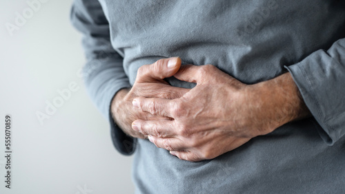 Senior man with stomach pain