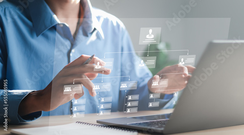 Organization chart with hierarchy structure of teams and employees in company. Business process and workflow automation with flowchart. Business and technology concept.