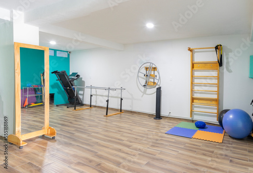 Latino physiotherapy clinic, with handrails, stairs and physical rehabilitation equipment