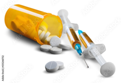 Drug abuse concept and two heroin syringes