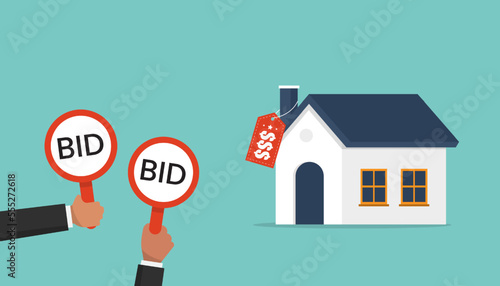 Businessmen hold bid signs for auction a house, buyers place bids, auction and bidding concept