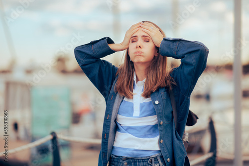 Stressed Woman Having a Bad Time During her Vacation . Exasperated tourist feeling lost and unhappy 