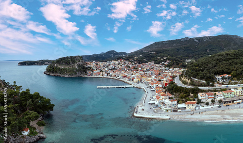 Parga Epirus Greece. Aerial drone view of waterfront Ionian city, coastal road, transparent sea.