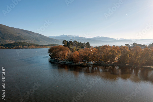 Greece, Pamvotida Lake, Giannena Epirus. Aerial drone view, blue sky background