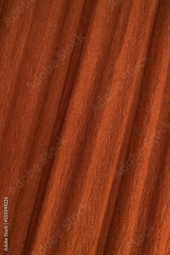 Textured background of brown crepe paper for crafts. Corrugated paper with a large background