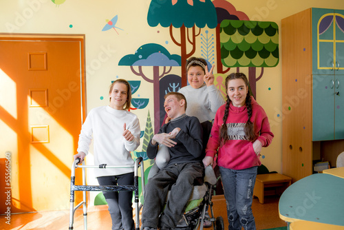 a group of teenagers with disabilities in a rehabilitation center.