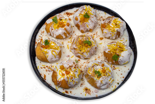 popular sweet spicy north indian chaat item dahi puri, dahi poori, dahi batata puri, dahi bhalle, gol gappa stuffed with potato, yogurt, sev, sprouts
