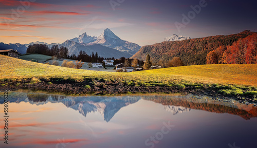 Scenic nature landscape during sunset. Watzmann mount reflection in crystal clear mountain lake on mountain valley. Famous Berchtesgaden land, Bavaria Alps, Germany. Popular travel destination