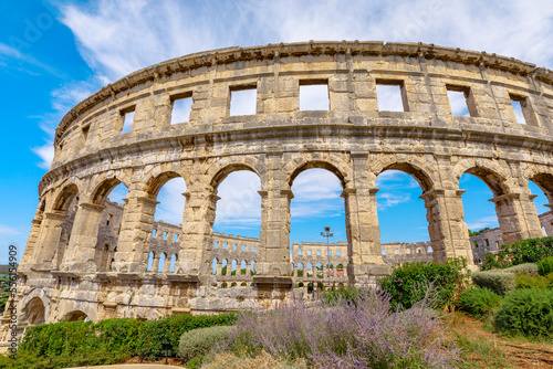 Pula Amphitheater, is a remarkably preserved structure from the Roman Empire. This arena was constructed in the Istrian region of Pula, Croatia, between 27 BC and 68 AD.