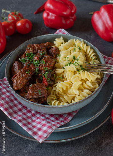 Hungarian goulash with pasta on a plate