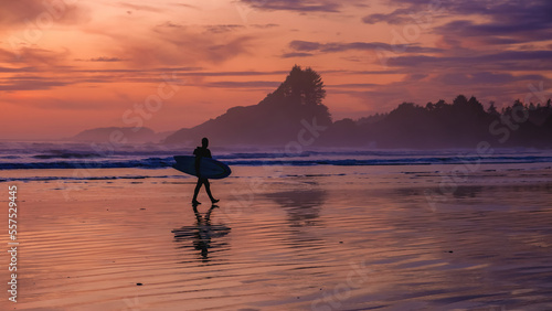 Tofino Vancouver Island Pacific rim coast, surfers with surfboard during sunset at the beach, surfers silhouette Canada Vancouver Island Tofino Vancouver Island