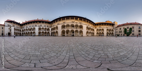 full 360 hdri panorama on main square in Wawel Castle of old town with historical buildings, temples and town hall with a lot of tourists in equirectangular projection