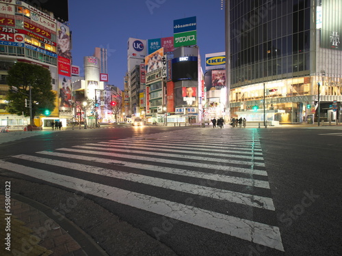 Tokyo, Japan - January 2, 2023: Shibuya scramble crossing at dawn. The crossing is quiet during the new year morning. 