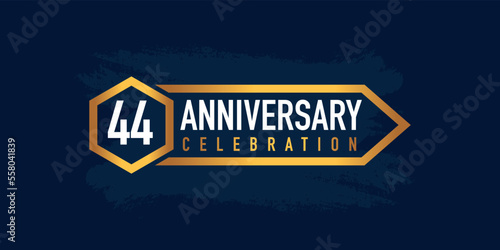 44 years anniversary celebration logotype colored with gold color and isolated on blue background. 