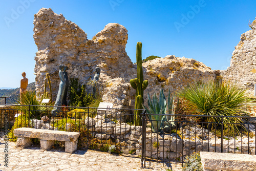 Ruins of medieval fortress castle in Exotic Botanic Garden Le Jardin de Exotique on top of historic town of Eze at Azure Cost of Mediterranean Sea in France
