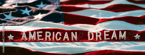 Small letters on the US flag. American dream concept background