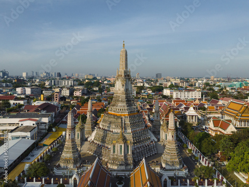 An aerial view of the Pagoda stands prominently at Wat Arun Temple with Chao Phraya River, The most famous tourist attraction in Bangkok, Thailand.