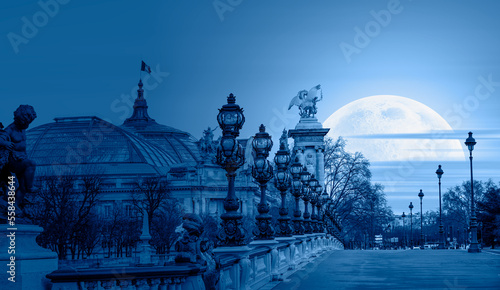 Alexandre III Bridge at sunset with full moon, Paris France "Elements of this image furnished by NASA"