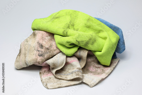 Pile of dirty old rag suspended isolated on white background.