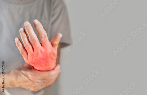 hands of a person in red