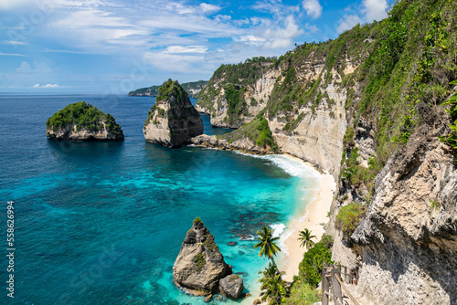 The beautiful sandy beach (Diamond beach) with rocky mountains and clear water in Nusa Penida, Bali, Indonesia